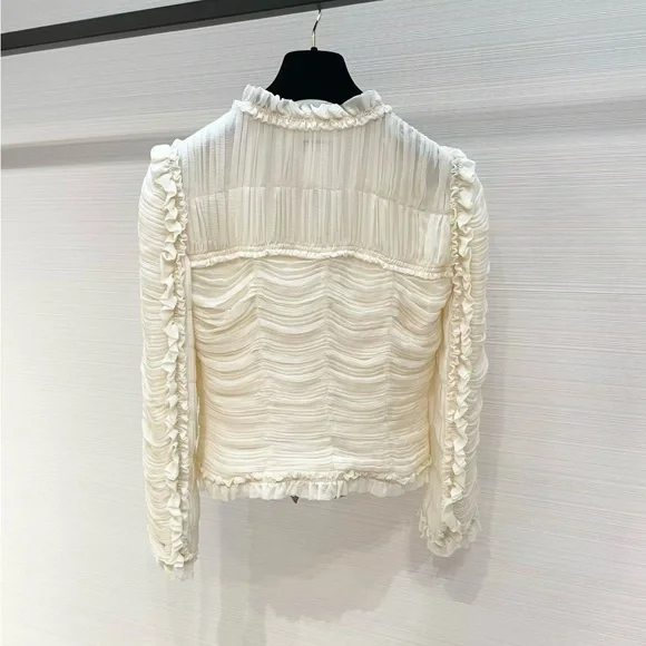 CHANEL Cream Ruffled Long-Sleeve Blouse with Black Bow Accents - Picture 2 of 7